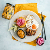 Butter Bike Rugged Peanut Butter served with fried eggs and pickles